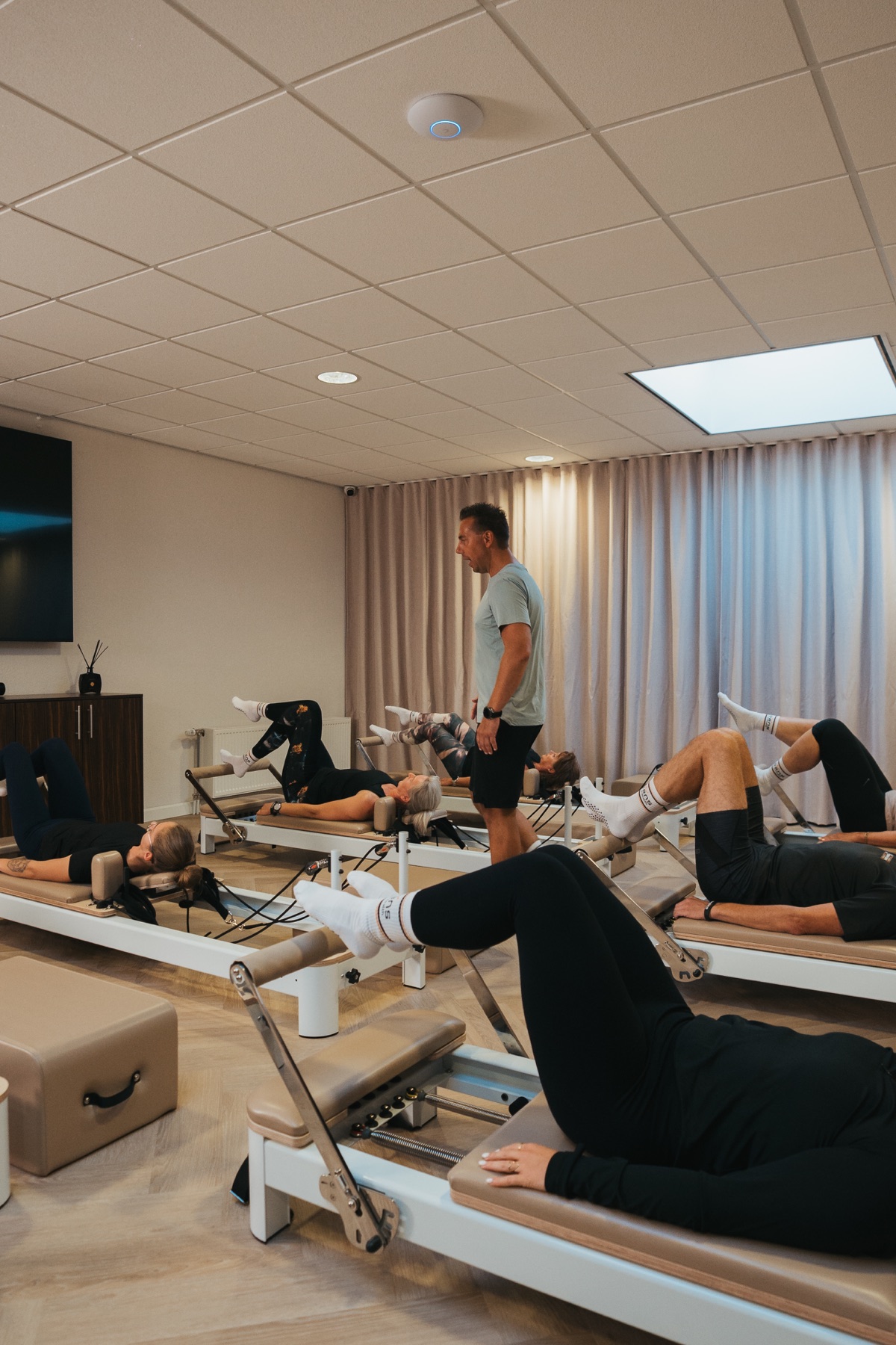 Een reformerpilatesles in de studio